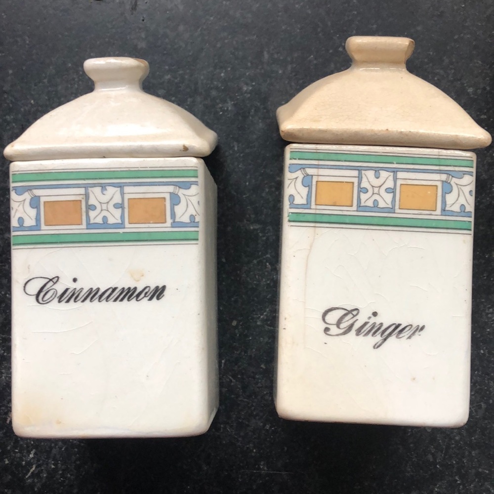 Two vintage spice canisters